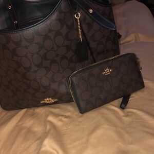 Coach brown and black barely used leather coach purse and wallet